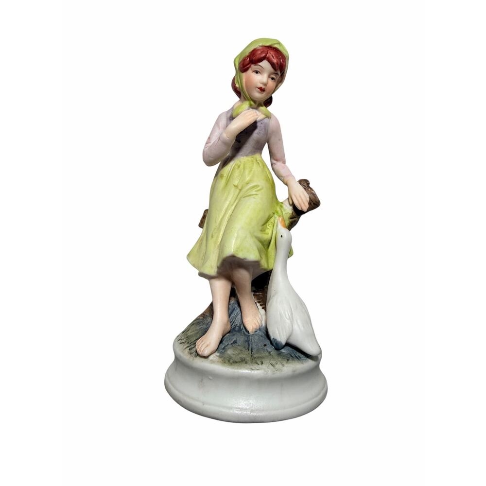 Vintage Figurine Ceramic Porcelain Girl in Green w Goose Sitting on Tree Stump